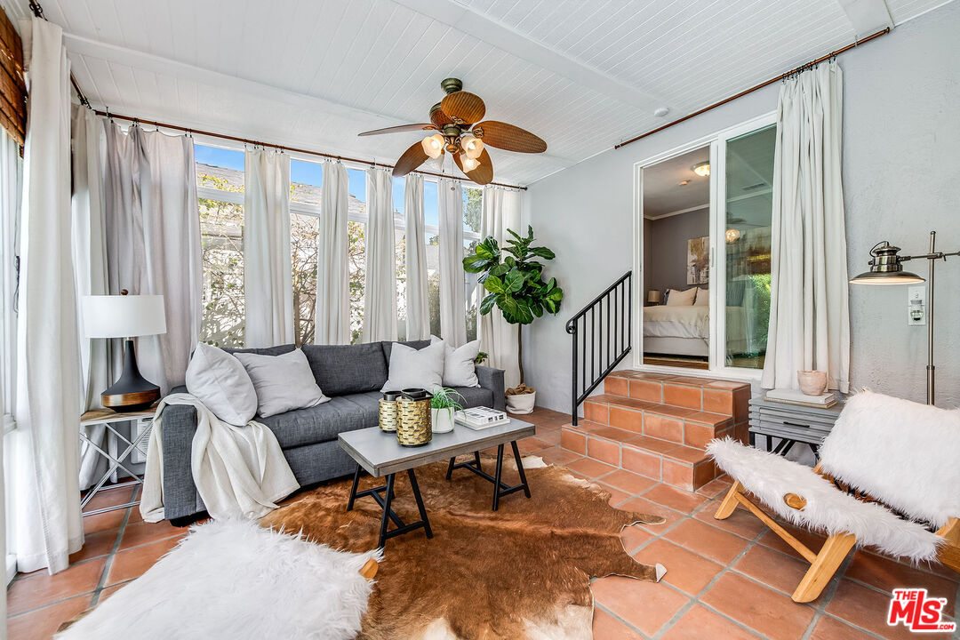 4539 Atoll Avenue Sherman Oaks, CA 91423 - Photo 22 of 28 a living room filled with furniture and a large window