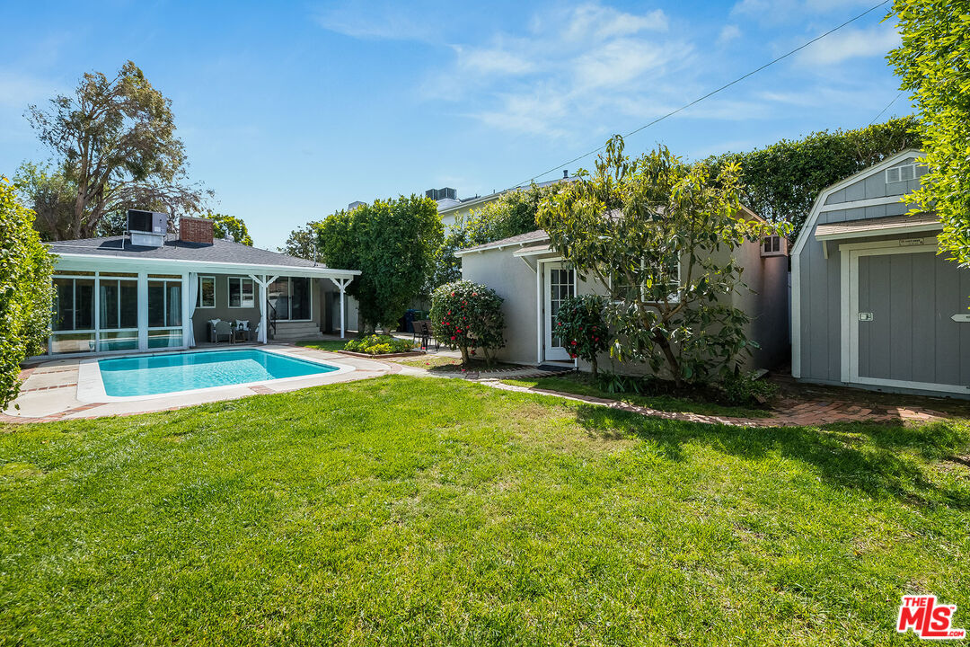4539 Atoll Avenue Sherman Oaks, CA 91423 - Photo 26 of 28 a view of house with a swimming pool