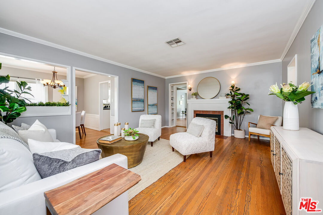 4539 Atoll Avenue Sherman Oaks, CA 91423 - Photo 5 of 28 a living room with furniture and a large window