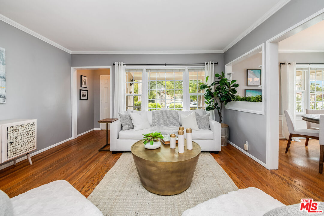 4539 Atoll Avenue Sherman Oaks, CA 91423 - Photo 6 of 28 a living room with furniture and a large window