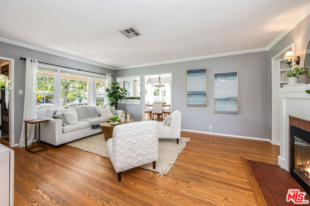 4539 Atoll Avenue Sherman Oaks, CA 91423 - Photo 7 of 28 a living room with furniture and a large window