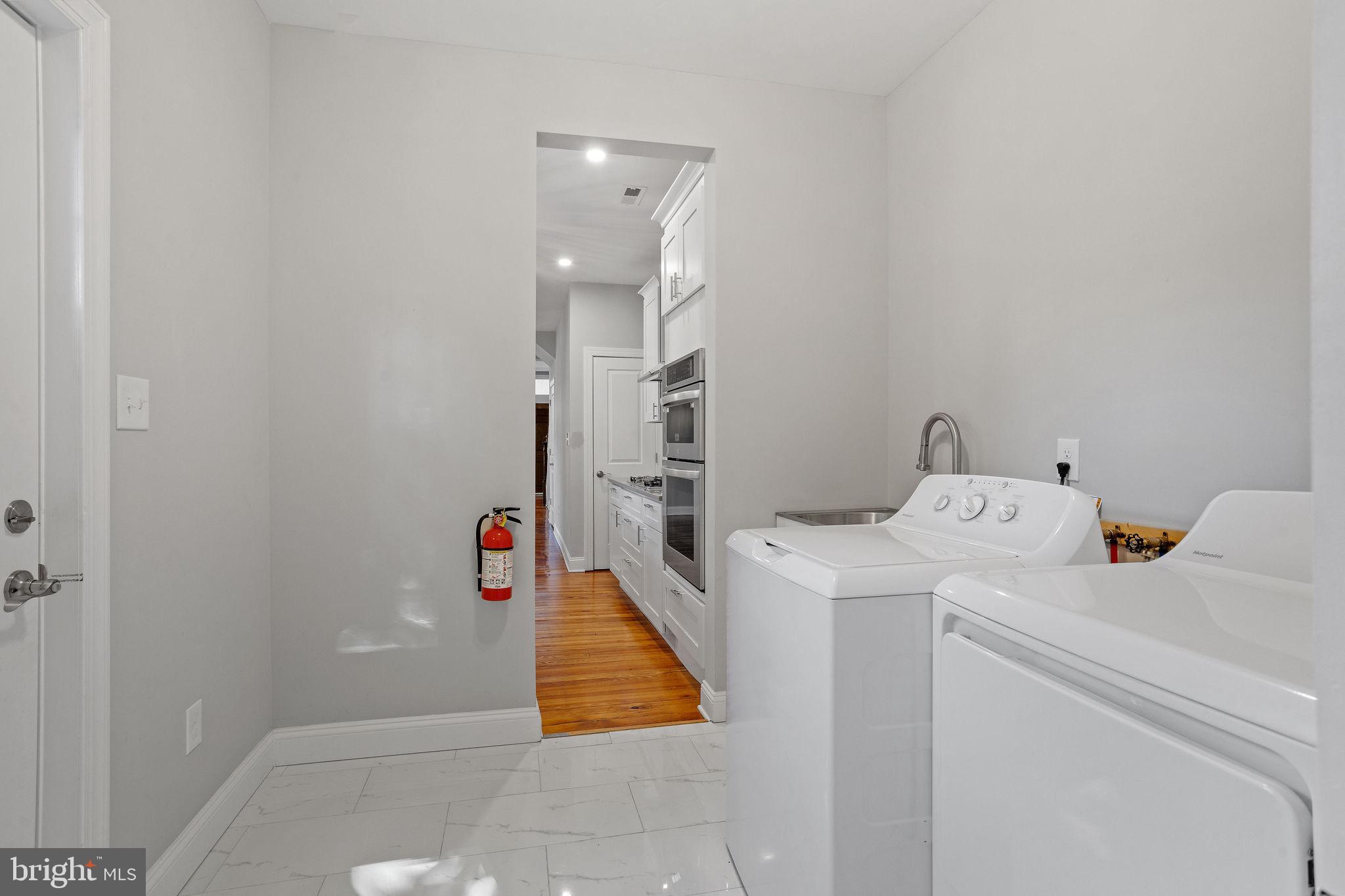 144 Snyder Place Moorestown, NJ 08057 - Photo 16 of 36 a utility room with dryer and washer