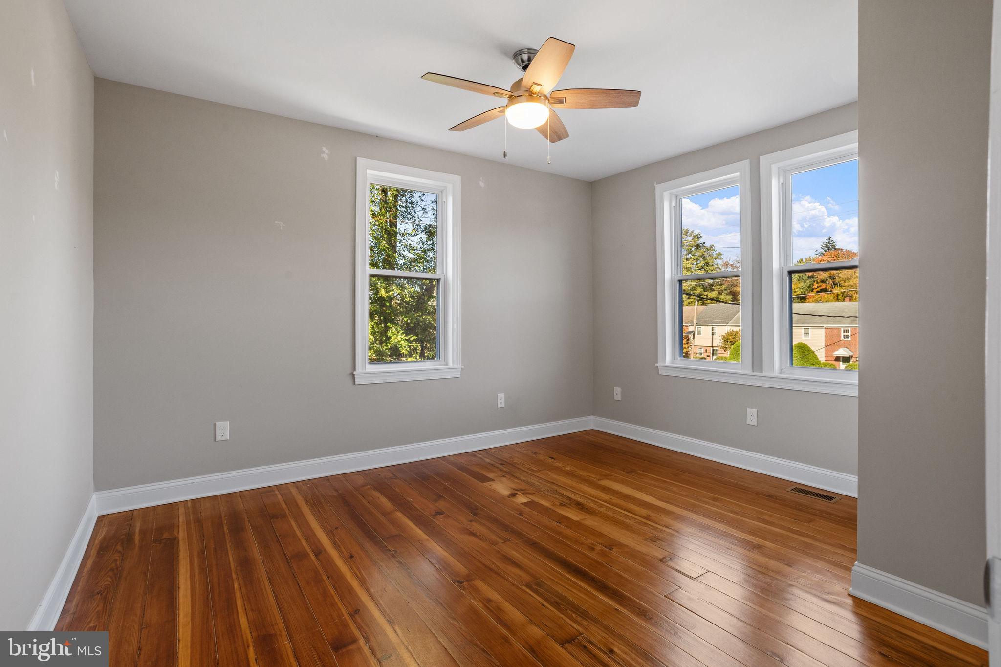 144 Snyder Place Moorestown, NJ 08057 - Photo 18 of 36 wooden floor in an empty room with a window