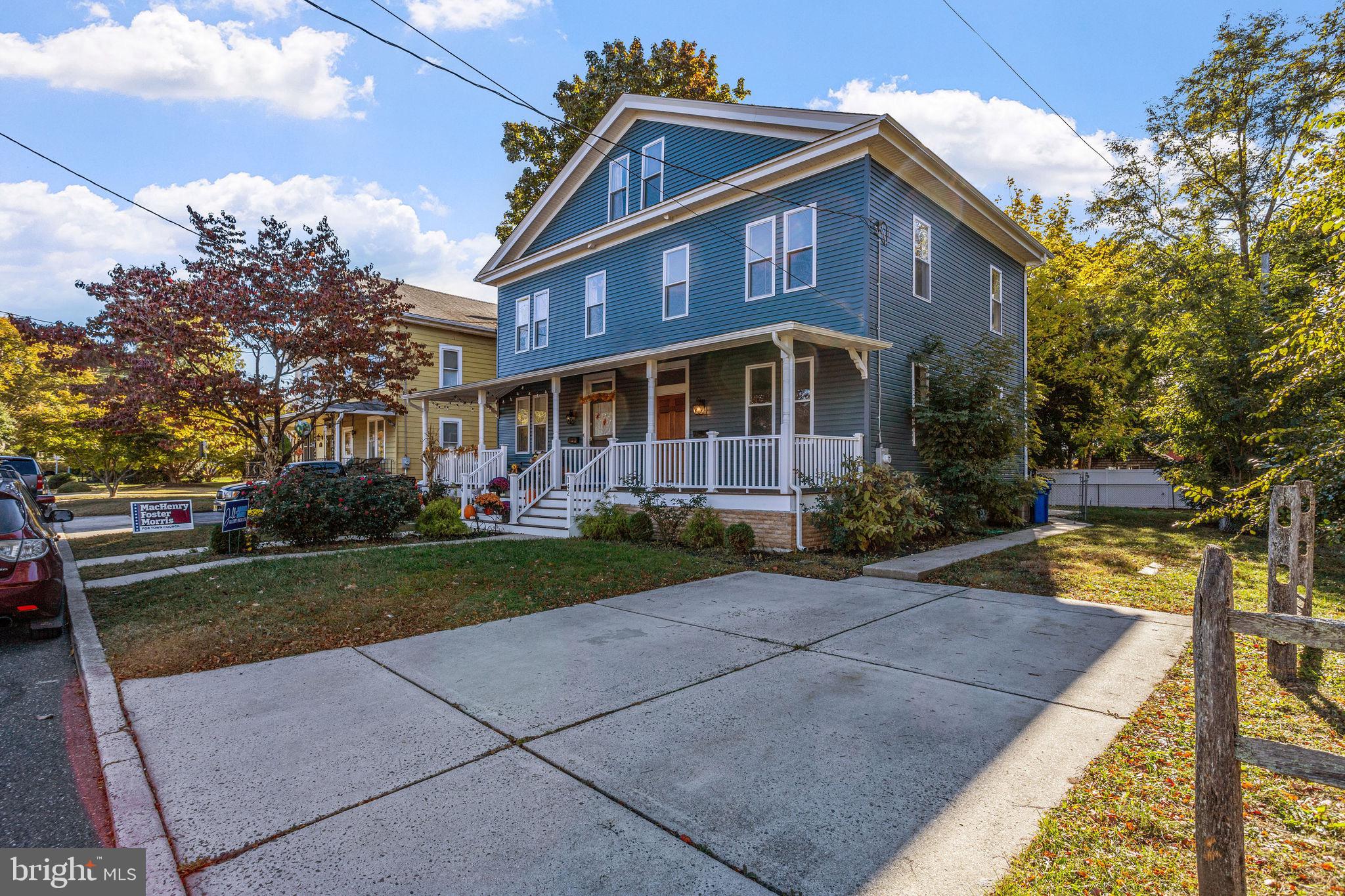 144 Snyder Place Moorestown, NJ 08057 - Photo 2 of 36 a view of a brick building next to a yard