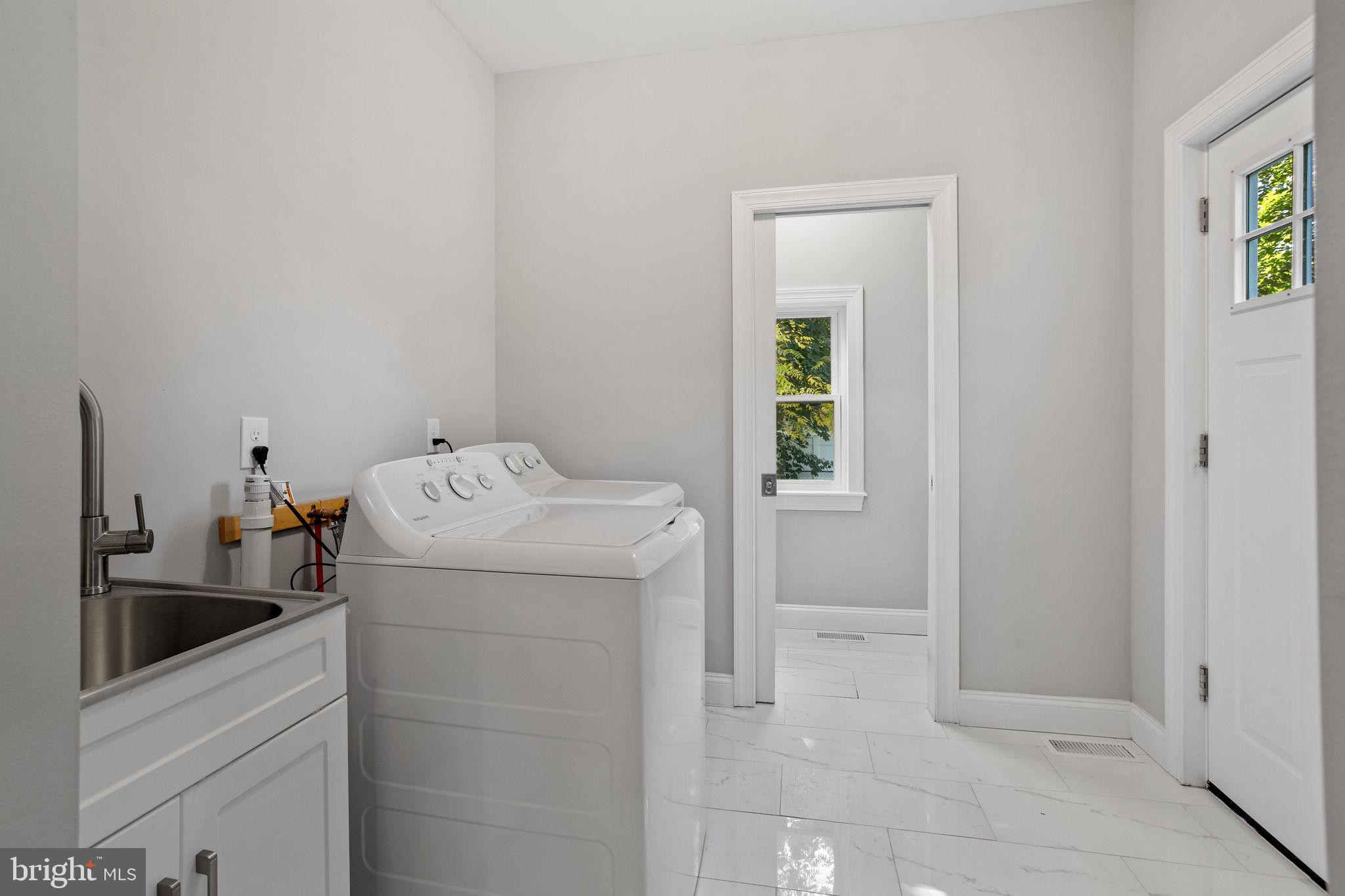 144 Snyder Place Moorestown, NJ 08057 - Photo 27 of 36 a utility room with dryer and washer