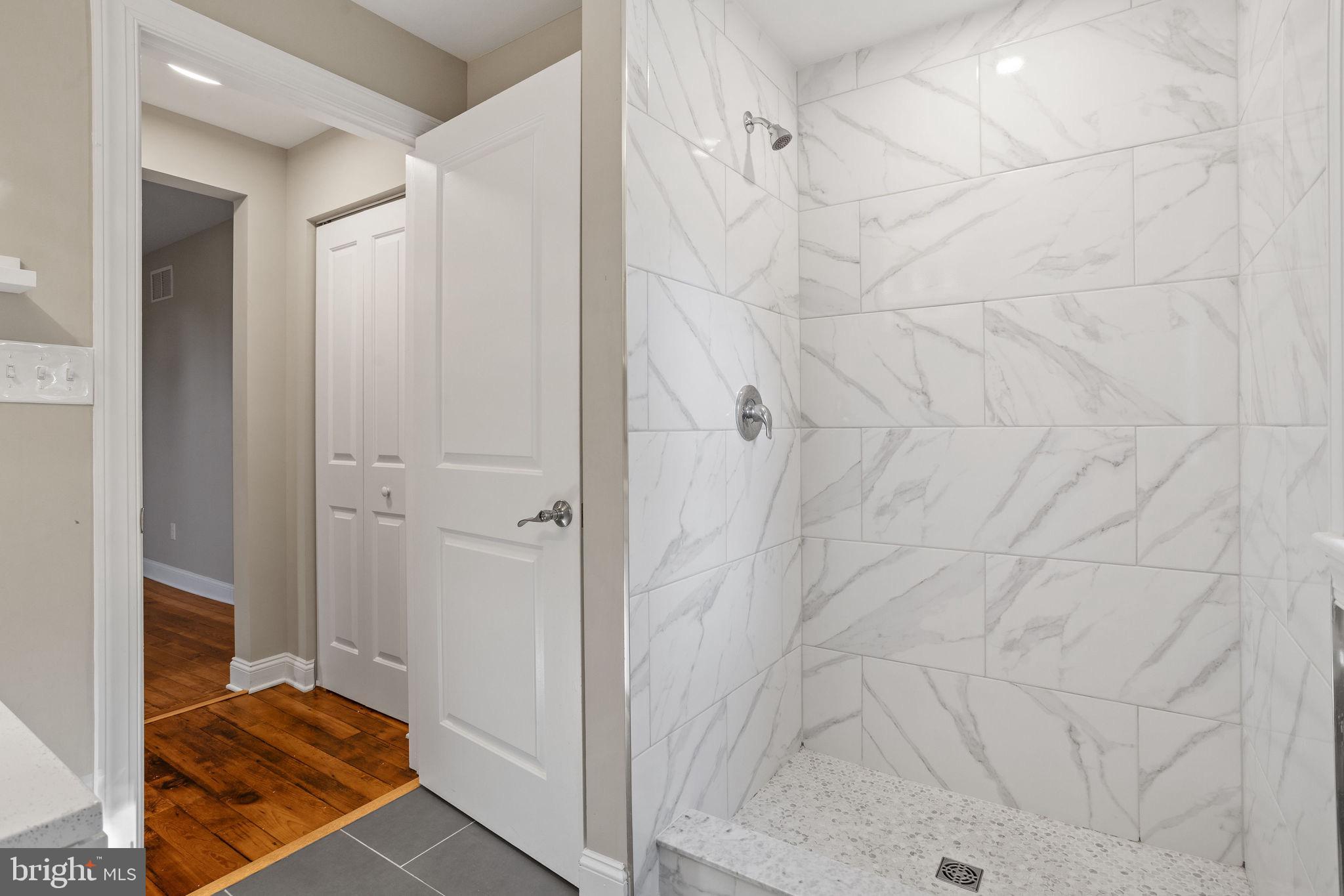 144 Snyder Place Moorestown, NJ 08057 - Photo 31 of 36 a bathroom with a sink and shower