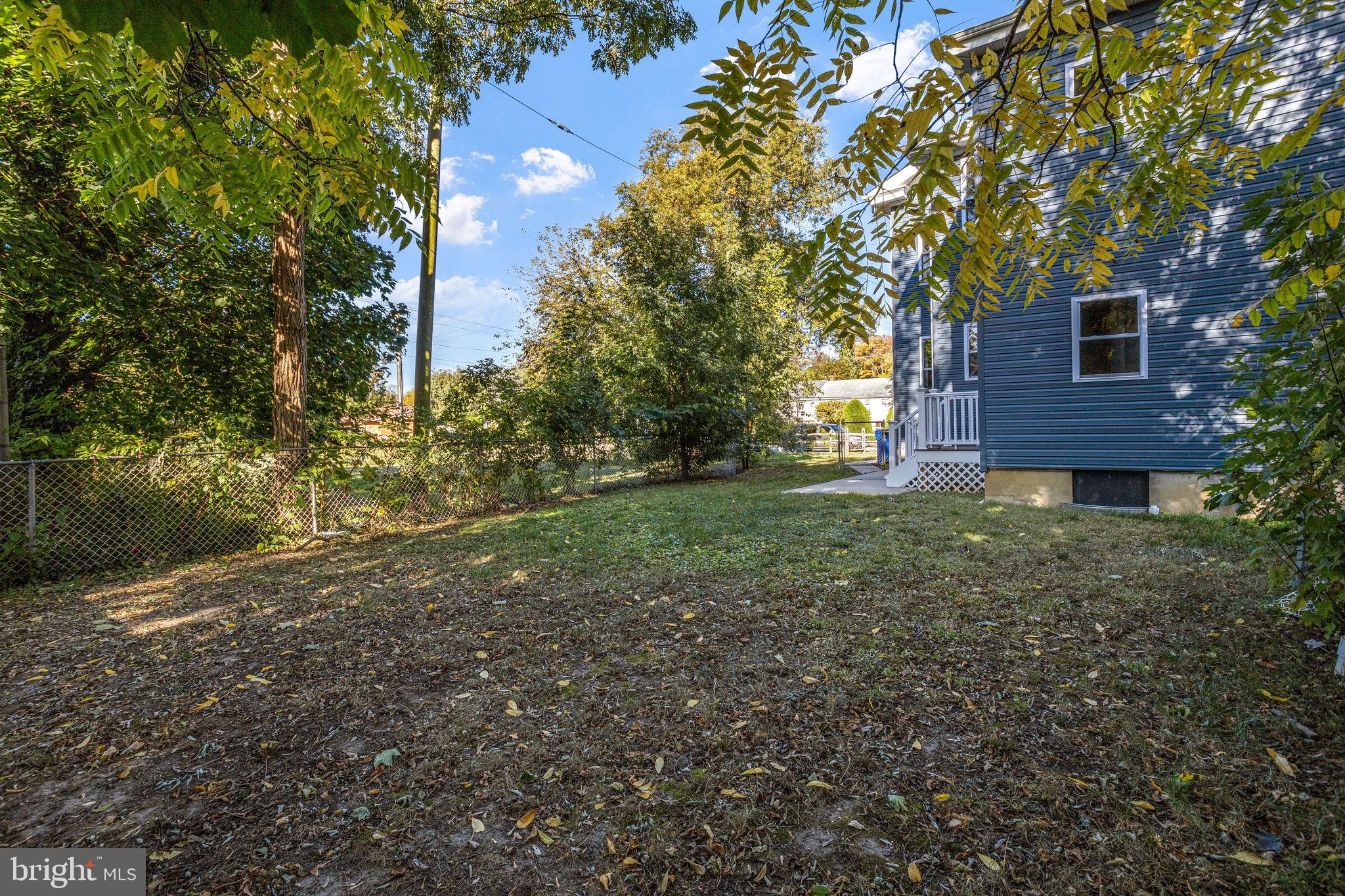 144 Snyder Place Moorestown, NJ 08057 - Photo 7 of 36 a view of a backyard with a tree