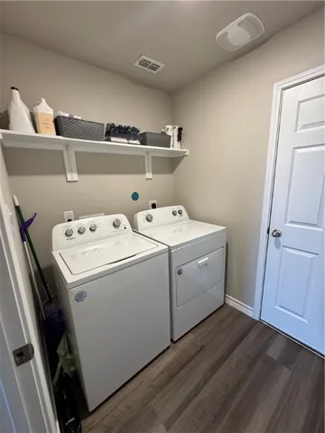 a utility room with dryer and washer