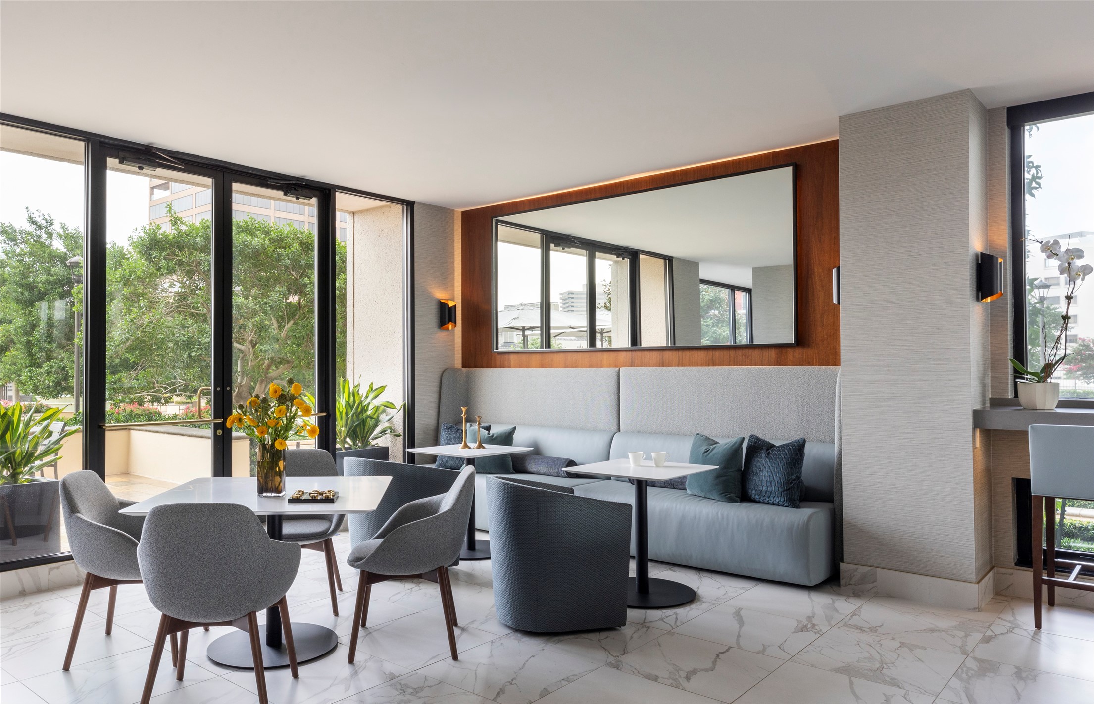 1111 Hermann Drive, Unit 28D Houston, TX 77004 - Photo 33 of 49 a living room with furniture and large windows