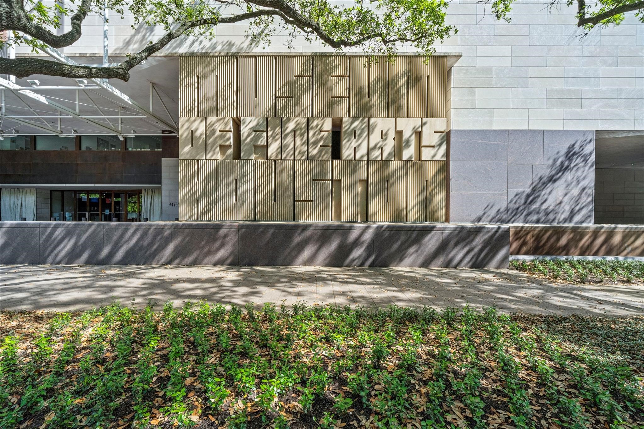 1111 Hermann Drive, Unit 28D Houston, TX 77004 - Photo 43 of 49 a view of outdoor space with sliding door and wooden fence