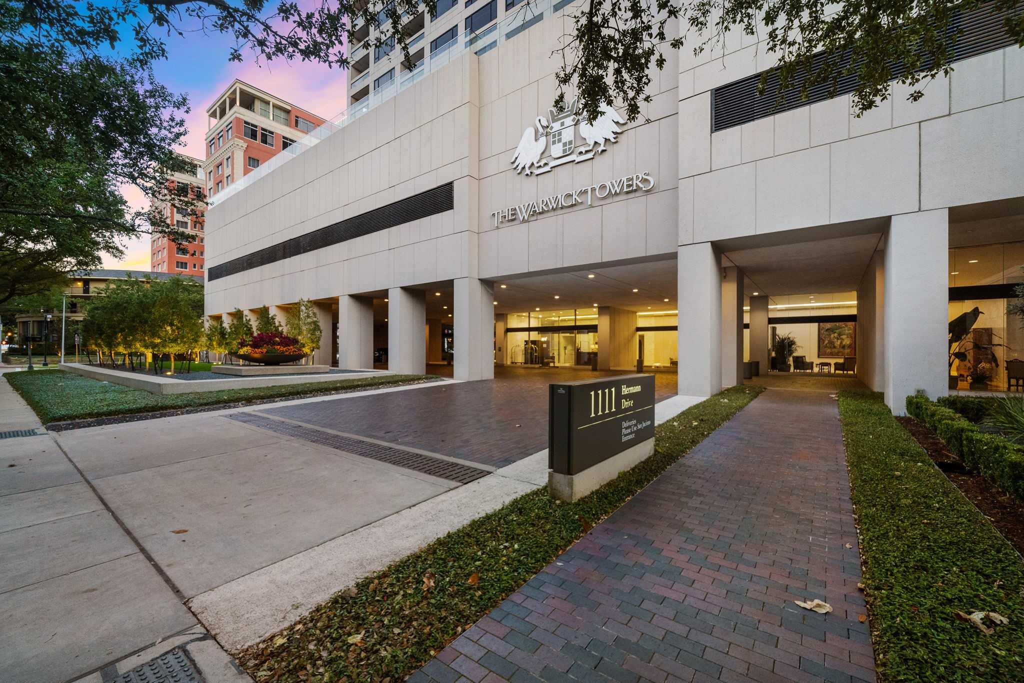 1111 Hermann Drive, Unit 28D Houston, TX 77004 - Photo 47 of 49 a view of a building with a street