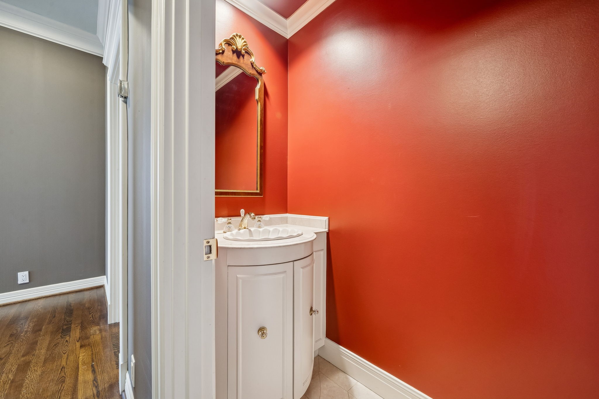1111 Hermann Drive, Unit 28D Houston, TX 77004 - Photo 9 of 49 a bathroom with a sink and a mirror