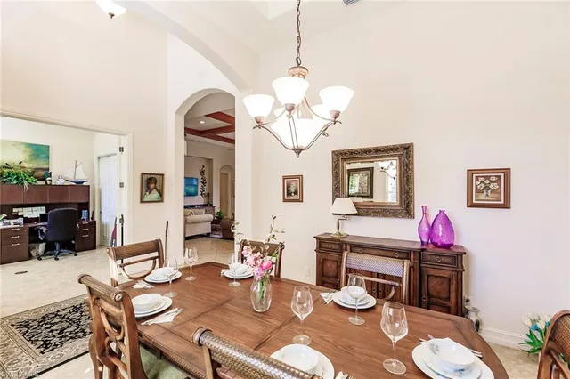 a living room with fireplace furniture and wooden floor