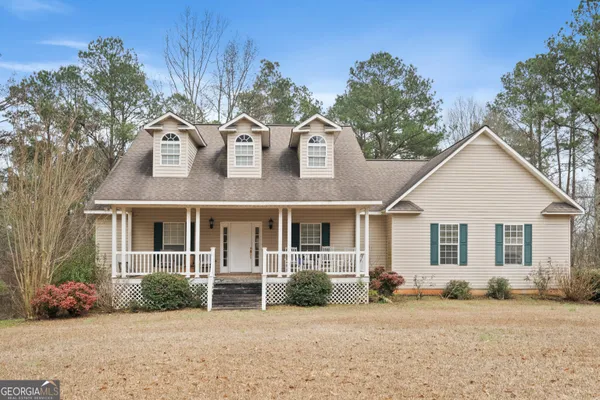front view of a house with a patio