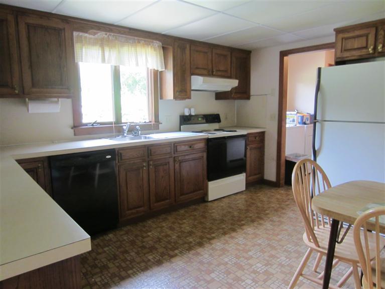 16 Forest Road Forestdale, MA 02644 - Photo 6 of 9 a kitchen with stainless steel appliances granite countertop a sink stove and refrigerator
