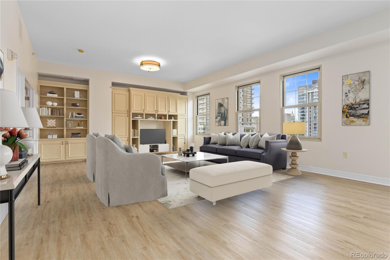 475 West 12th Avenue, Unit 6G Denver, CO 80204 - Photo 2 of 44 a living room with furniture and a flat screen tv
