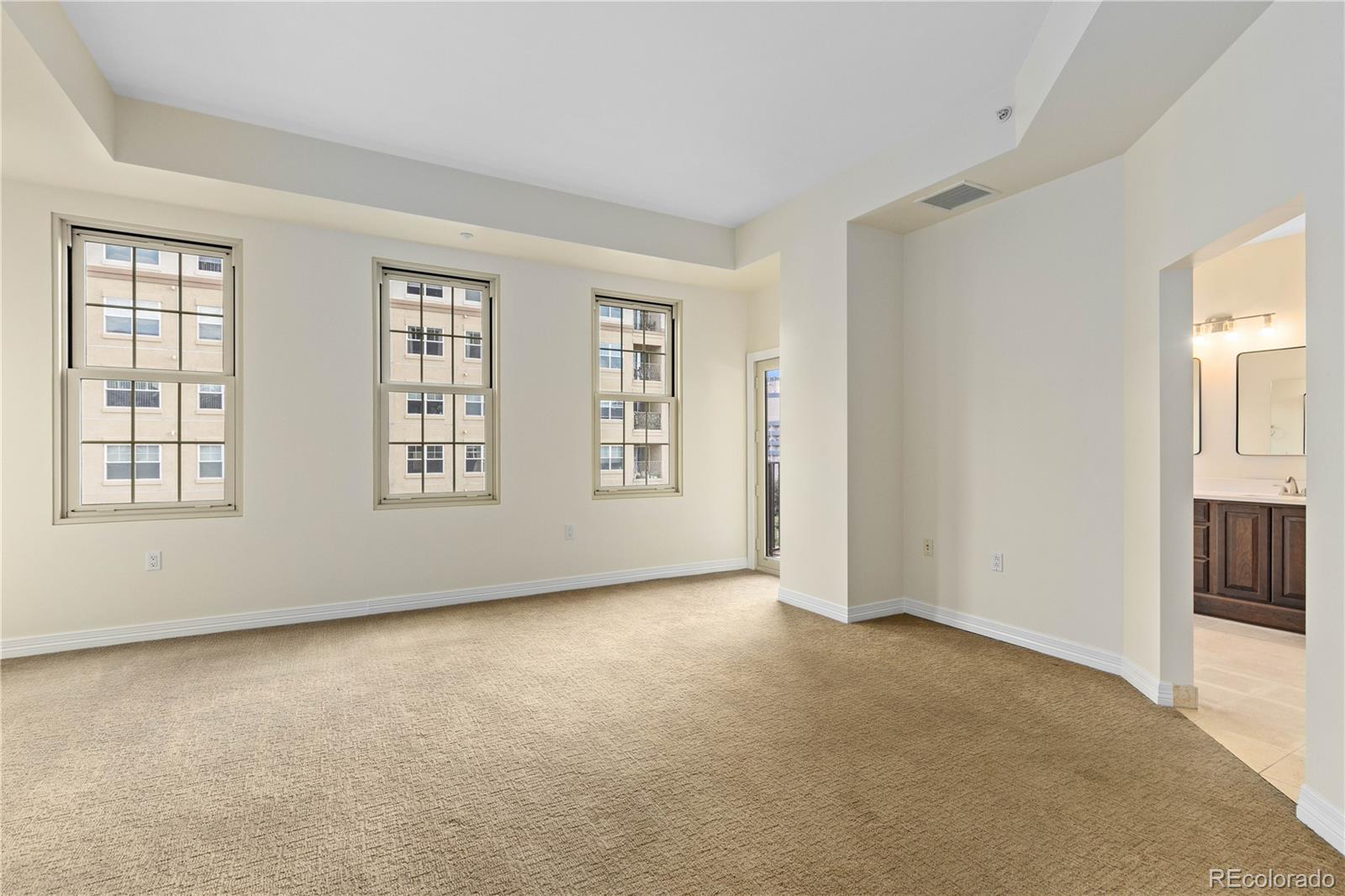 475 West 12th Avenue, Unit 6G Denver, CO 80204 - Photo 21 of 44 an empty room with windows