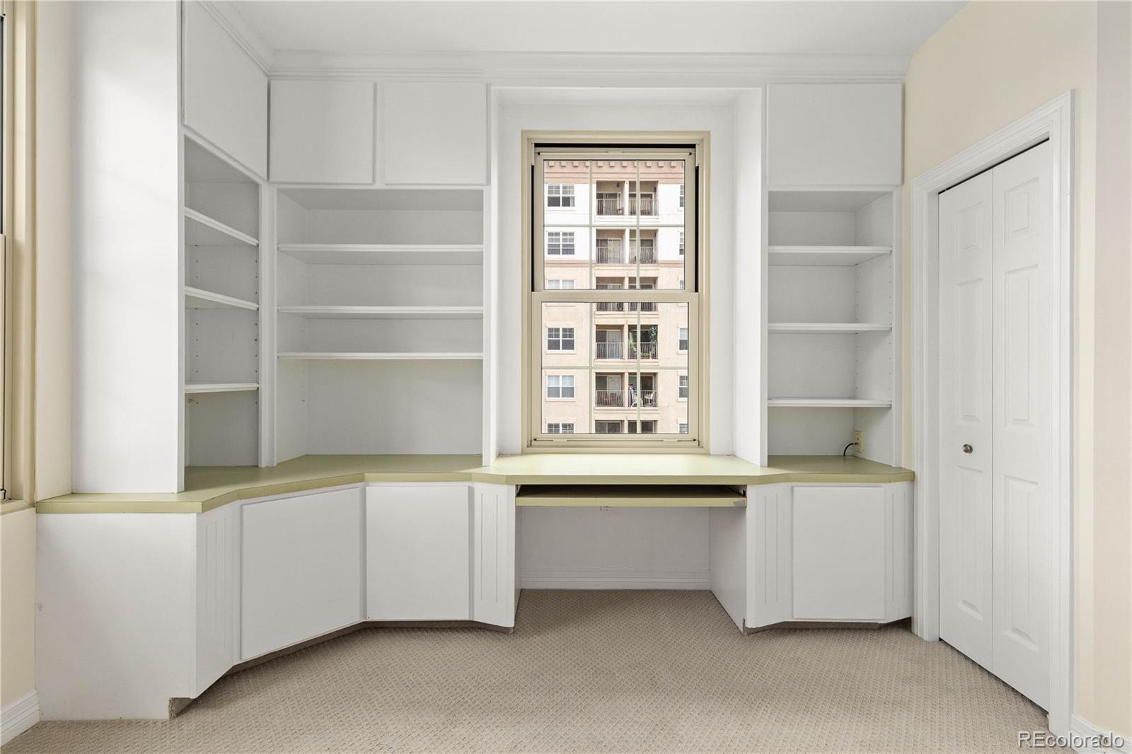 475 West 12th Avenue, Unit 6G Denver, CO 80204 - Photo 30 of 44 a room with a desk and cabinets