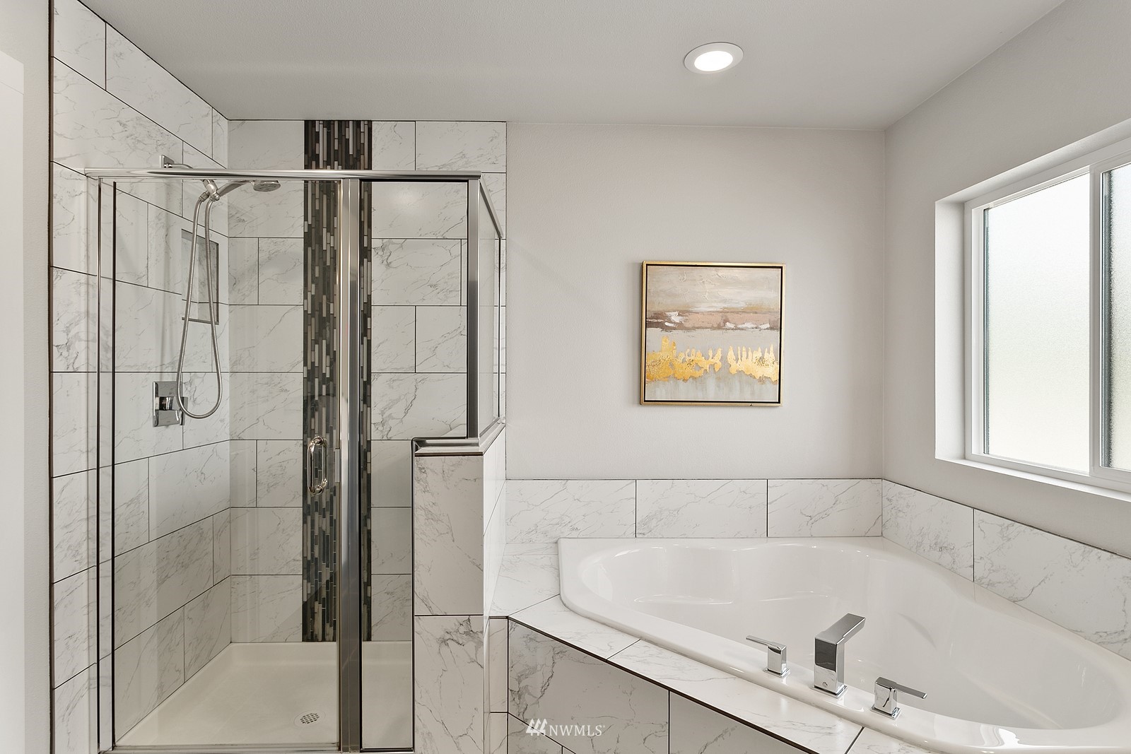 20527 Richmond Road Bothell, WA 98012 - Photo 20 of 40 a bathroom with a bathtub and a shower