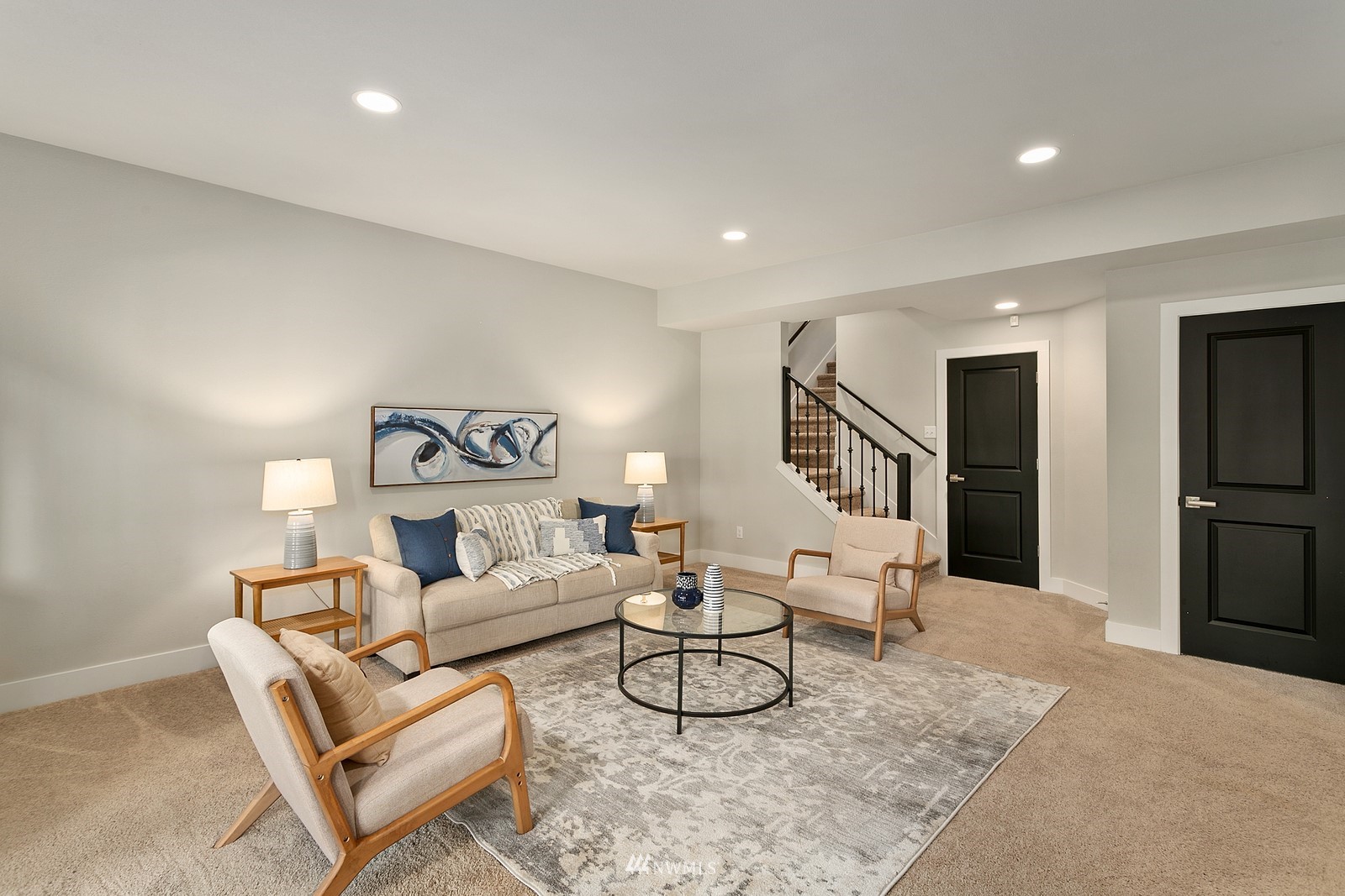 20527 Richmond Road Bothell, WA 98012 - Photo 27 of 40 a living room with furniture and a wooden floor