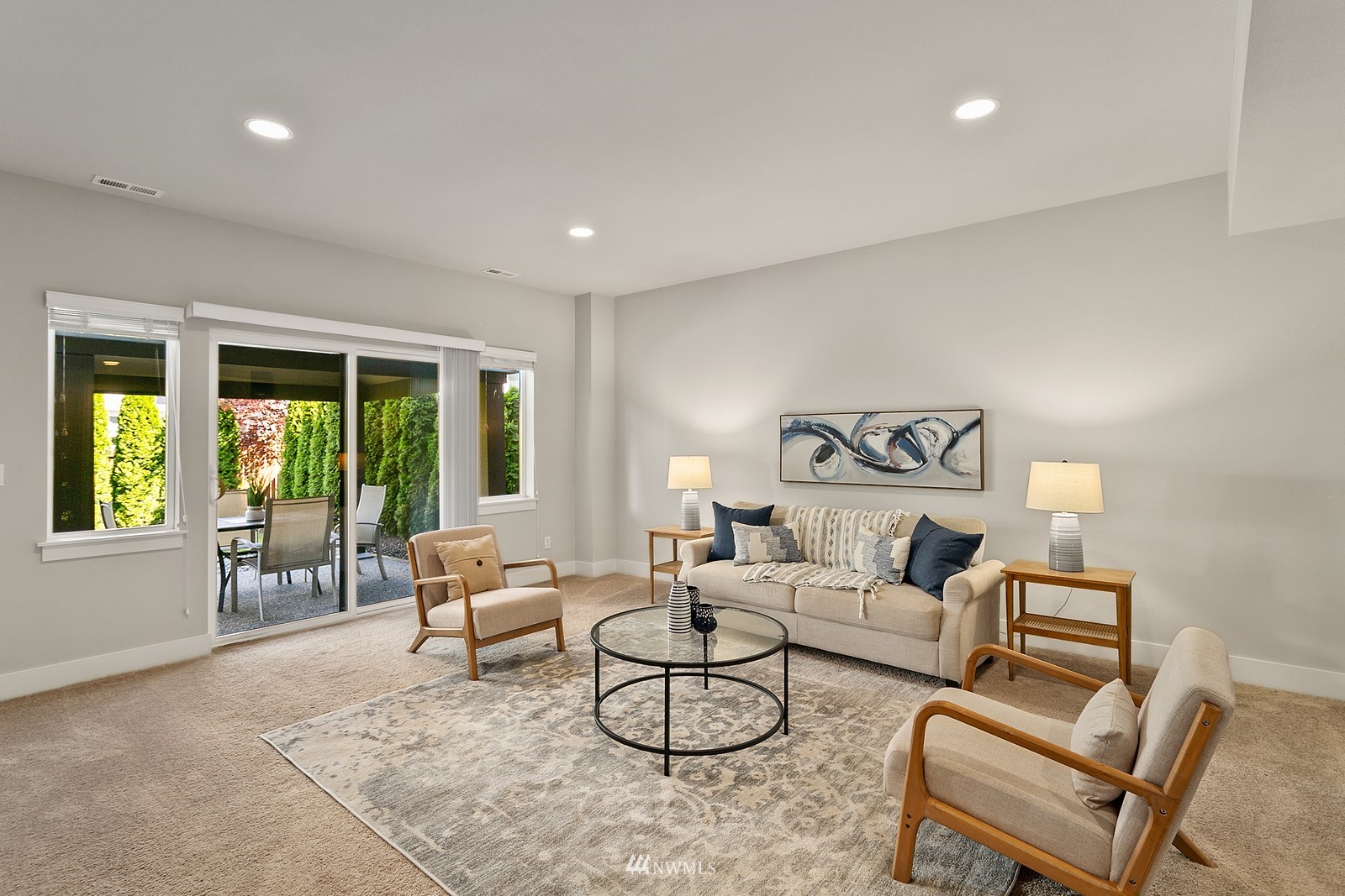 20527 Richmond Road Bothell, WA 98012 - Photo 28 of 40 a living room with furniture and a large window