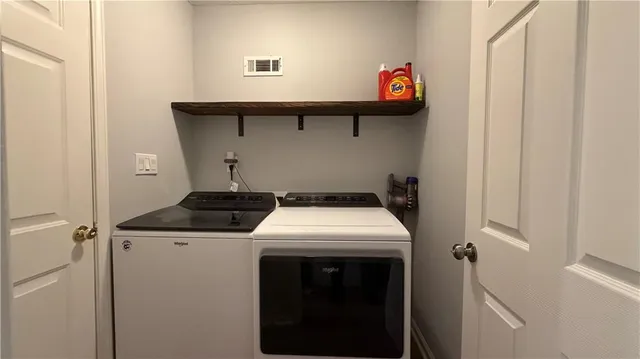 a workspace with furniture and a window