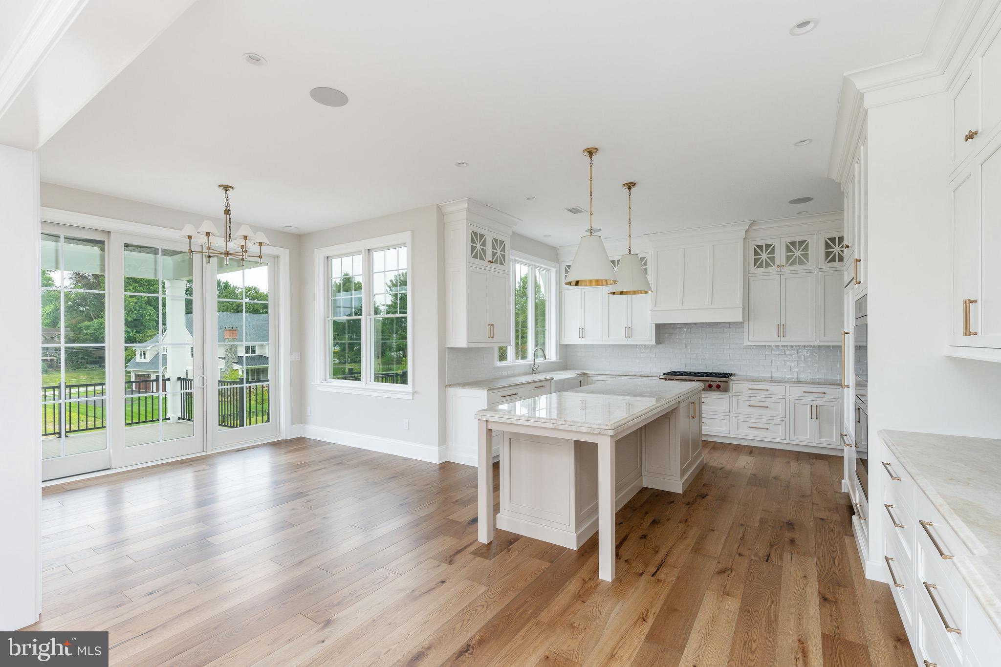 406 Barclay Road Bryn Mawr, PA 19010 - Photo 15 of 26 a kitchen with a sink and wooden floor