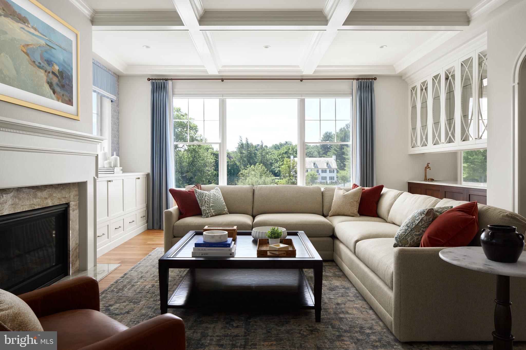 406 Barclay Road Bryn Mawr, PA 19010 - Photo 2 of 26 a living room with furniture and a fireplace