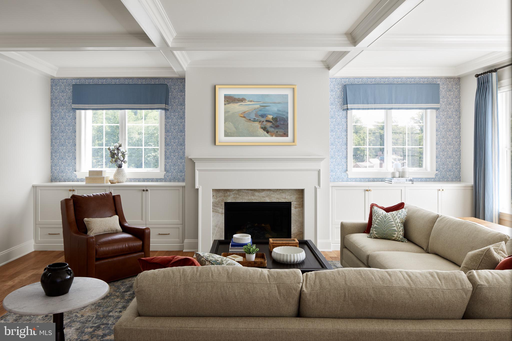 406 Barclay Road Bryn Mawr, PA 19010 - Photo 3 of 26 a living room with furniture a large window and a fireplace