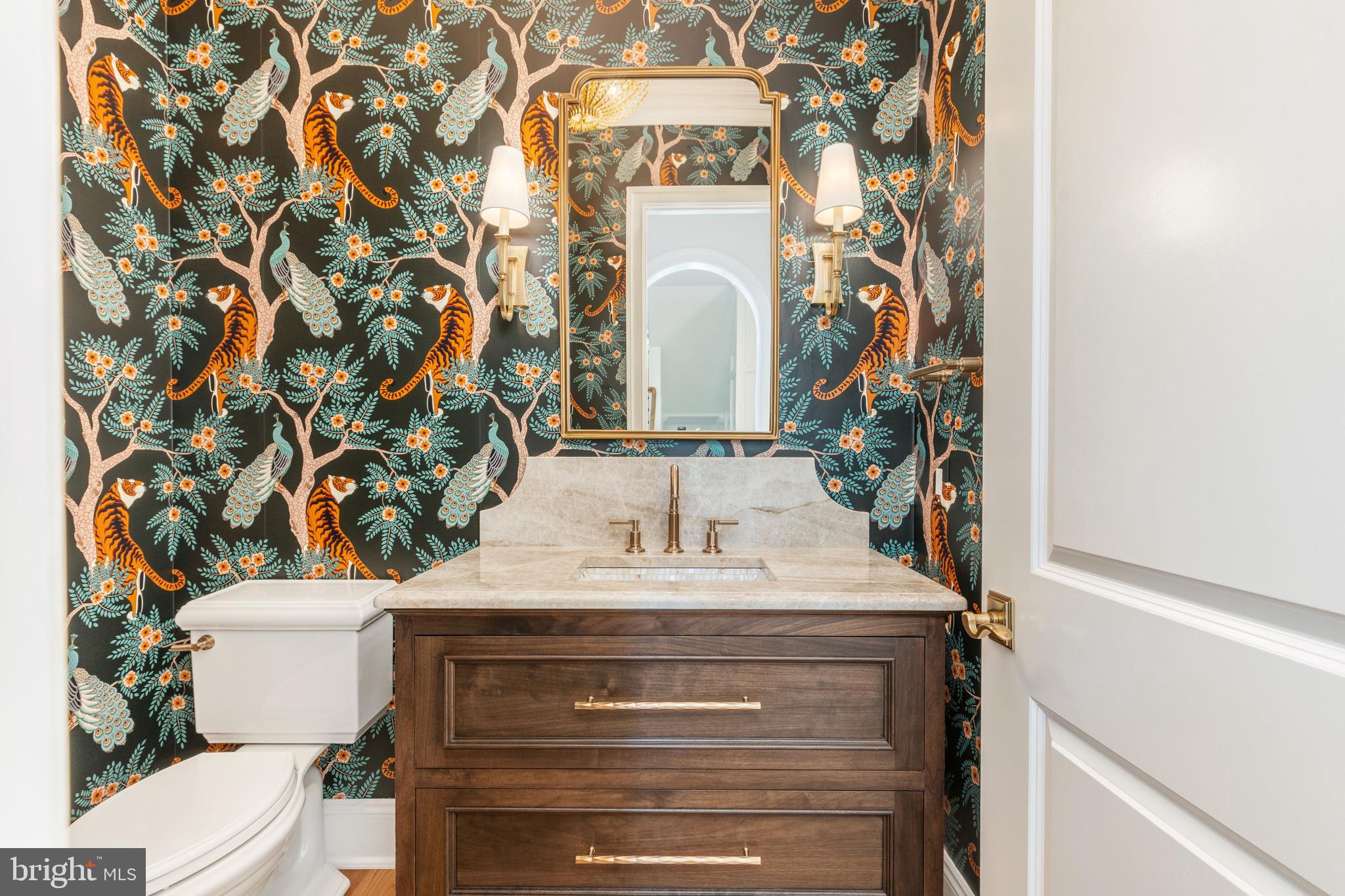 406 Barclay Road Bryn Mawr, PA 19010 - Photo 5 of 26 a bathroom with a sink and a mirror