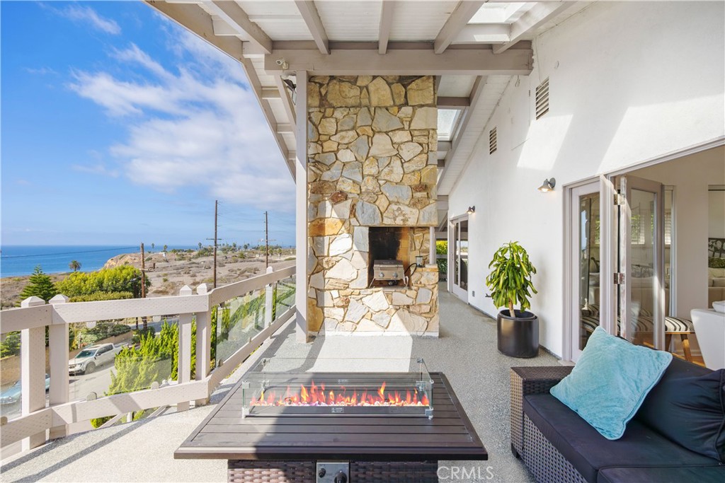 a living room filled with furniture and a table