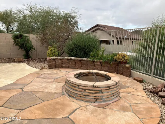 a view of a swimming pool with a lounge chair