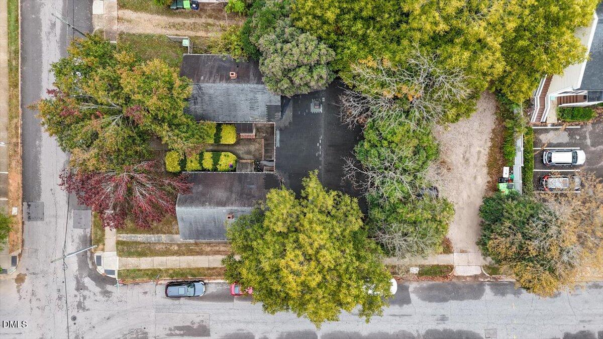 400 Chamberlain Street Raleigh, NC 27607 - Photo 21 of 23 a front view of a house with a garden
