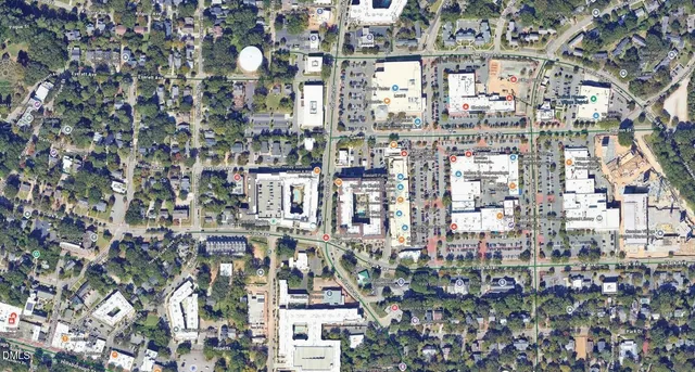 a picture of a bathroom with a window and a white door