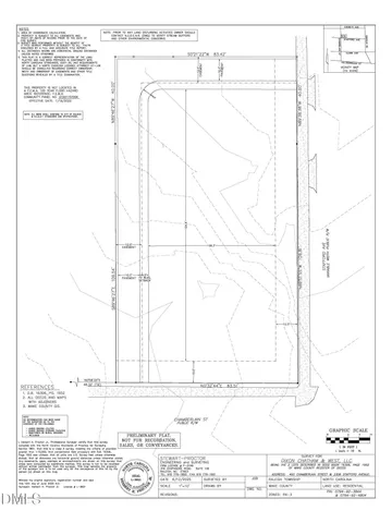 a window with a white comforter and a wooden floor