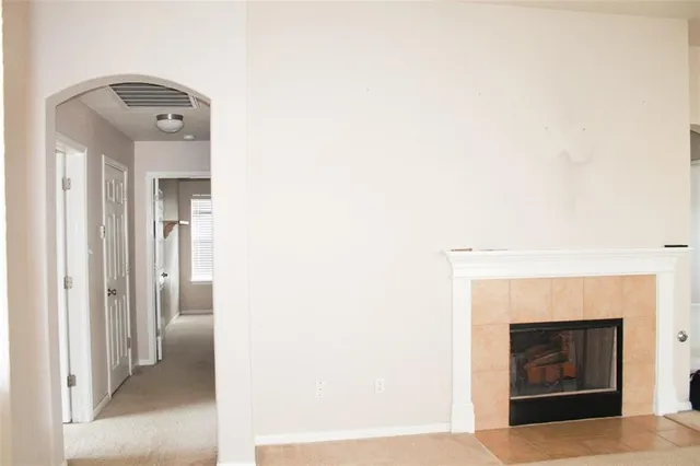 a view of a livingroom with a fireplace