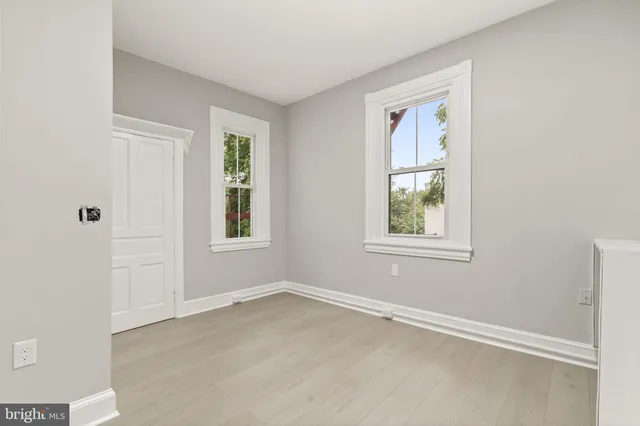 an empty room with windows