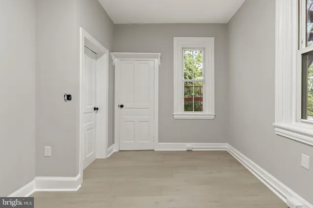 a view of a room that has a window in it