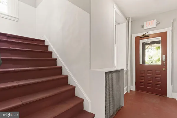 a view of entryway with wooden floor