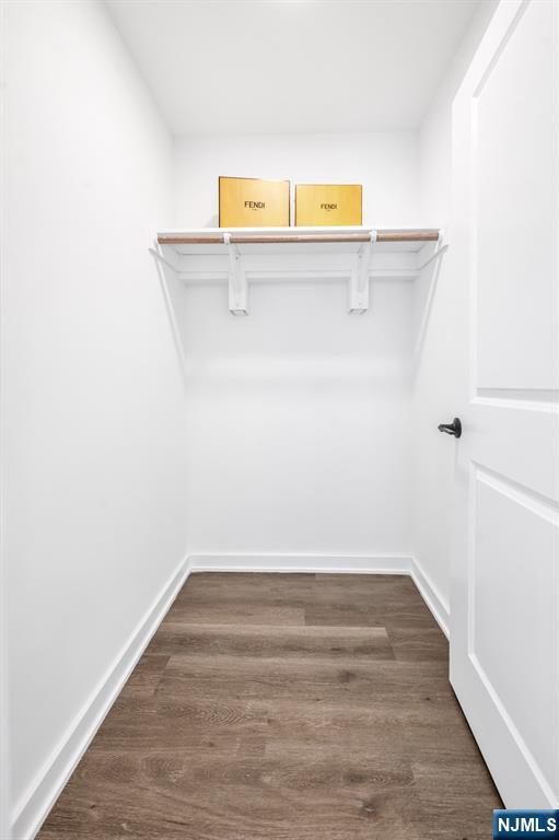 315 Railroad Avenue, Unit 114 East Rutherford, NJ 07073 - Photo 18 of 28 a view of a room with wooden floor