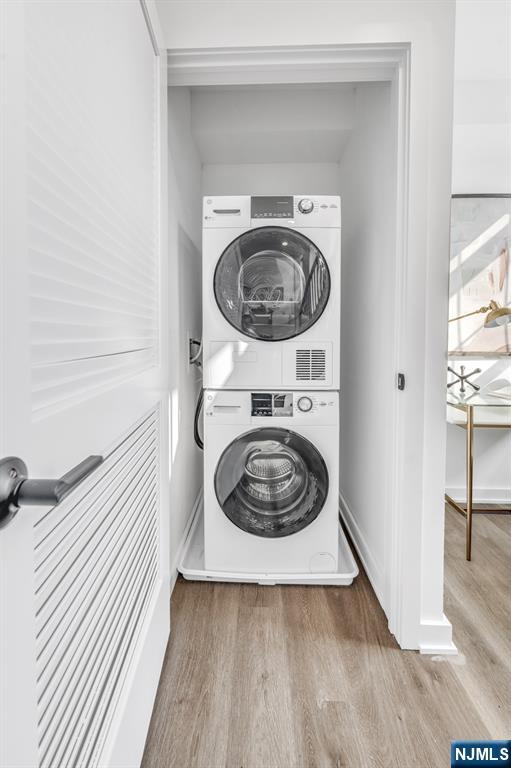 315 Railroad Avenue, Unit 114 East Rutherford, NJ 07073 - Photo 21 of 28 a utility room with dryer and washer