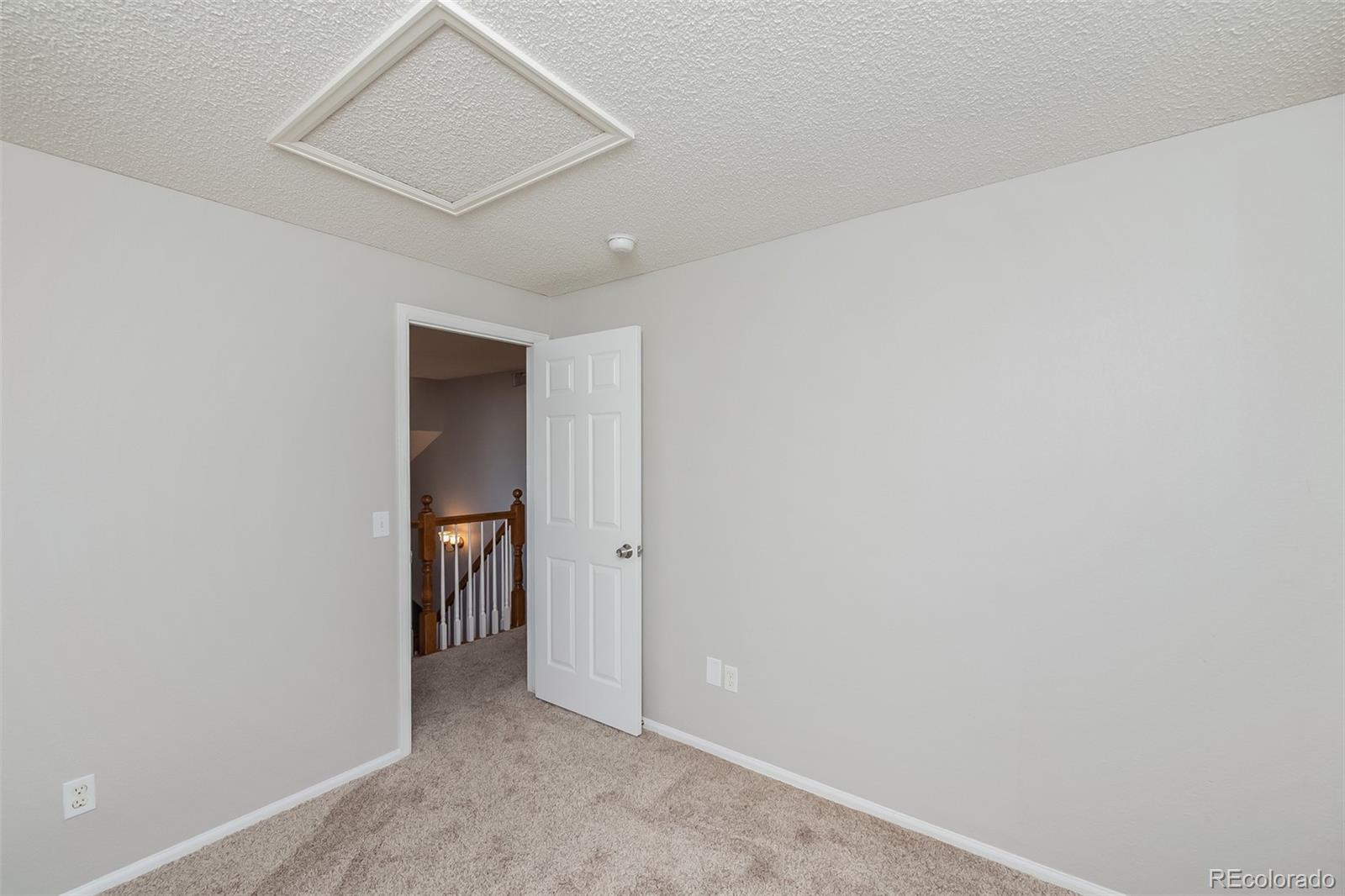2229 South Truckee Street Aurora, CO 80013 - Photo 10 of 18 a view of an empty room