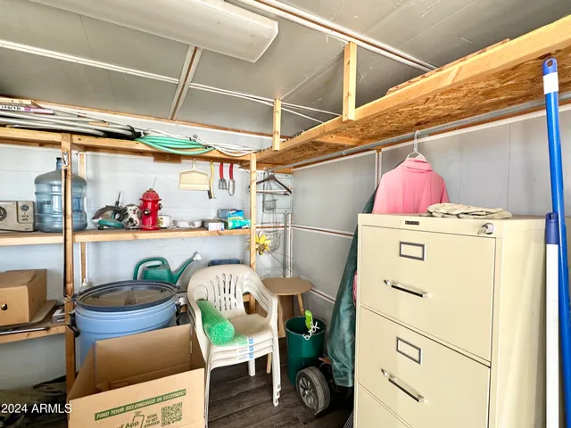 a view of swimming pool with outdoor seating