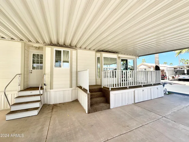 a view of a hallway with stairs