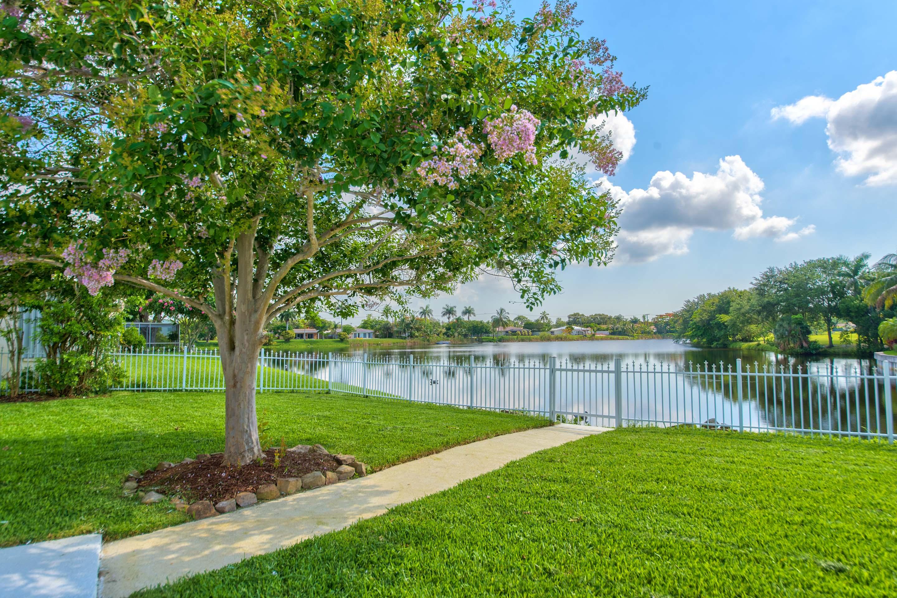 980 Southwest 11th Terrace Boca Raton, FL 33486 - Photo 8 of 19 a view of a garden with a lake view