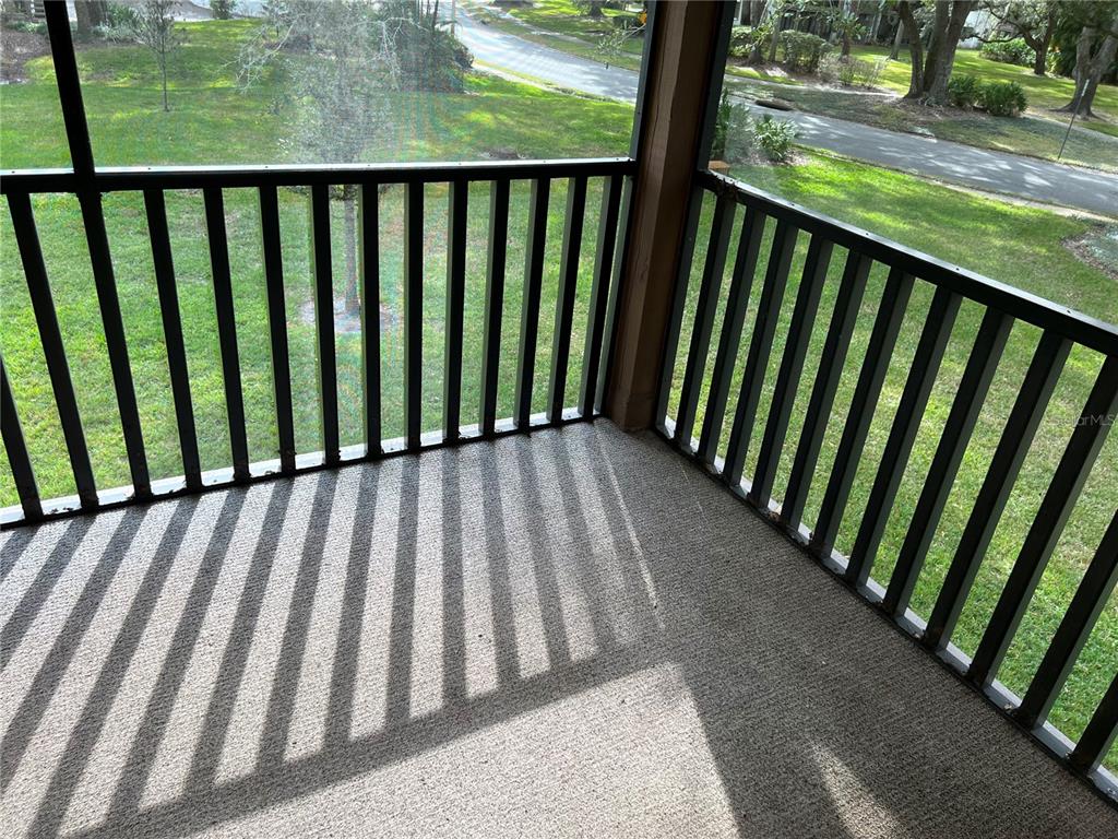 510 Mistletoe Court, Unit D Safety Harbor, FL 34695 - Photo 15 of 18 a view of outdoor space with deck