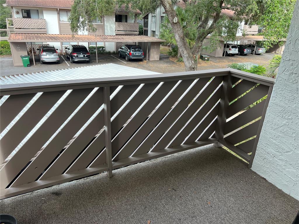510 Mistletoe Court, Unit D Safety Harbor, FL 34695 - Photo 16 of 18 a view of street with car parked