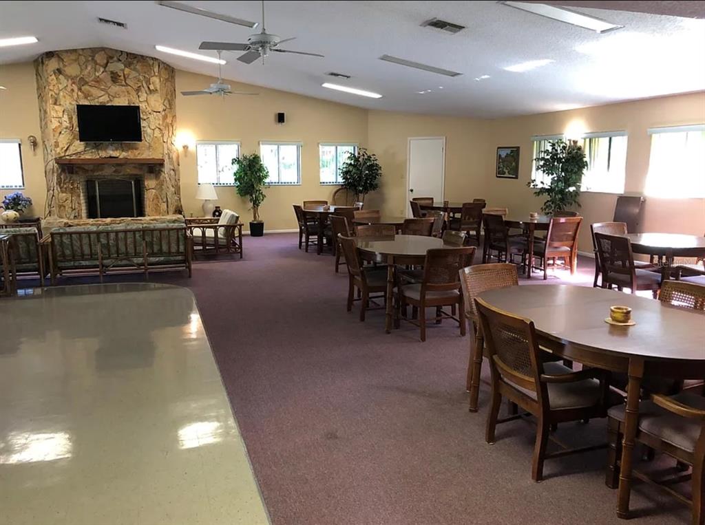 510 Mistletoe Court, Unit D Safety Harbor, FL 34695 - Photo 17 of 18 a view of a dining room with furniture