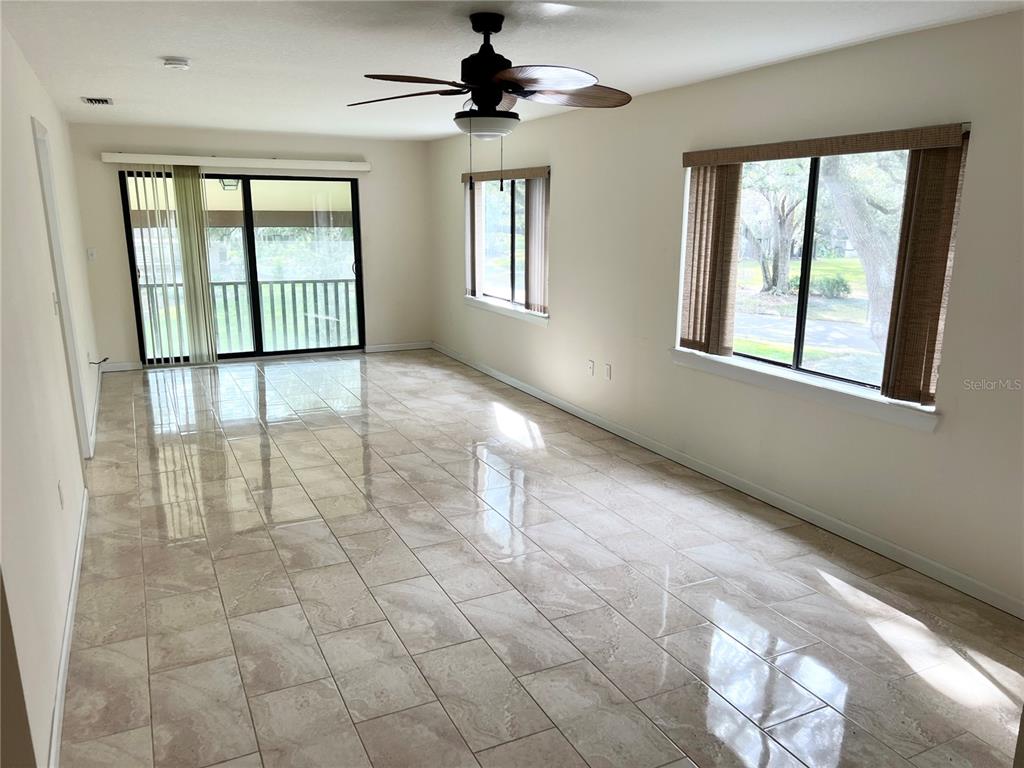 510 Mistletoe Court, Unit D Safety Harbor, FL 34695 - Photo 9 of 18 a view of an empty room with a window