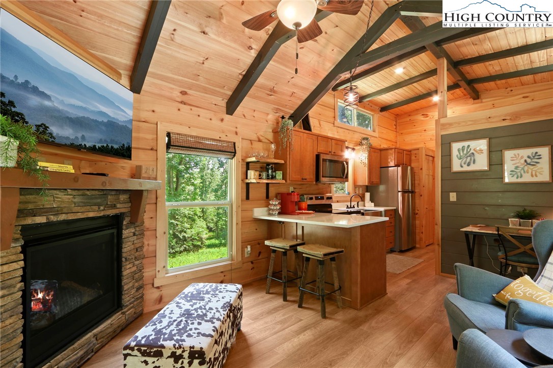 165 John Dotson Road Boone, NC 28607 - Photo 17 of 50 a view of a livingroom with furniture and a fireplace